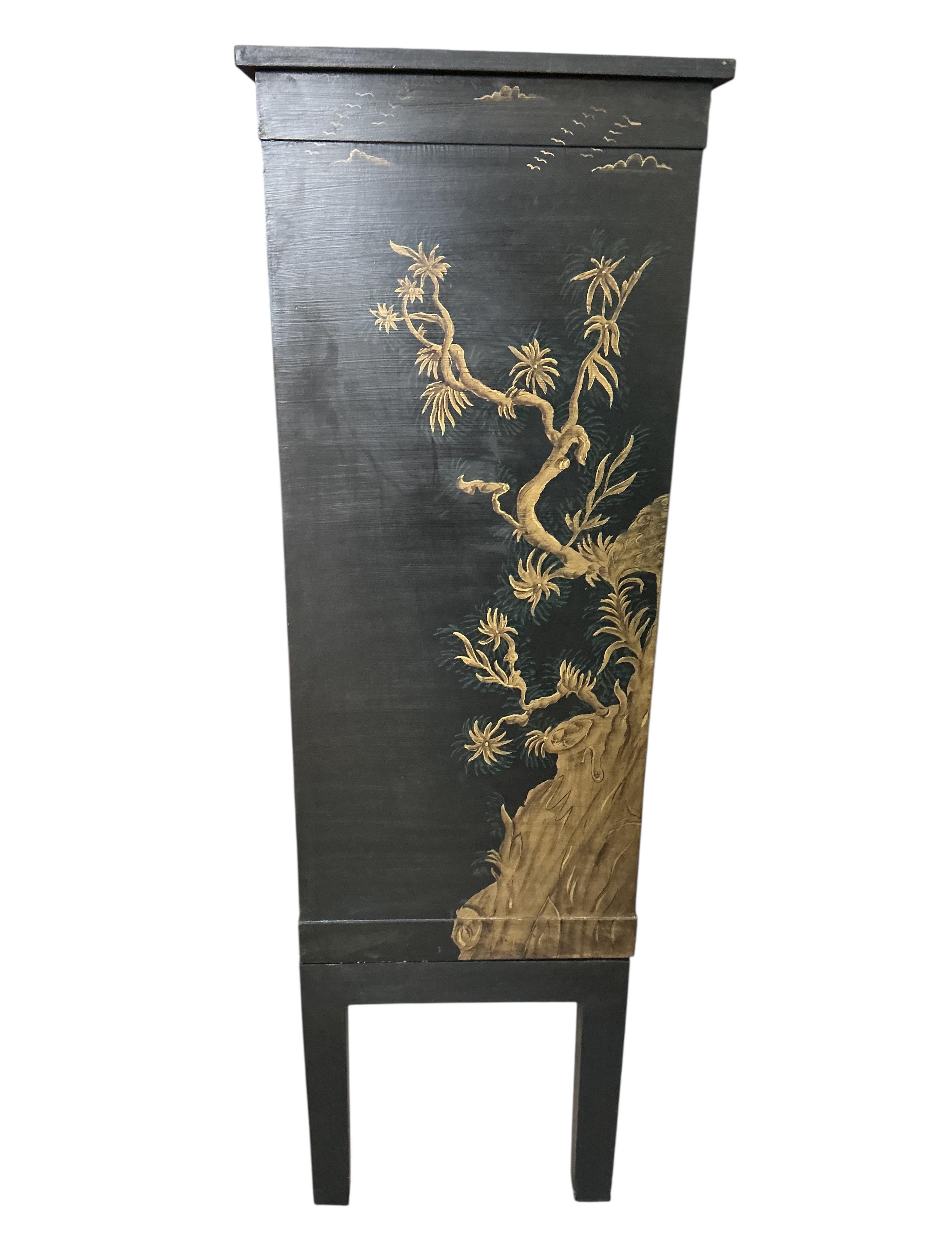 An OKA 'Peking' television cabinet, width 90cm, depth 46cm, height 140cm